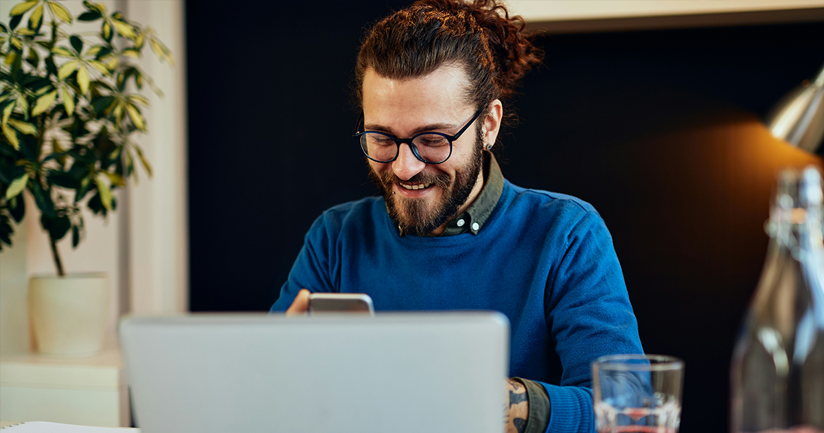 Man smiling at work